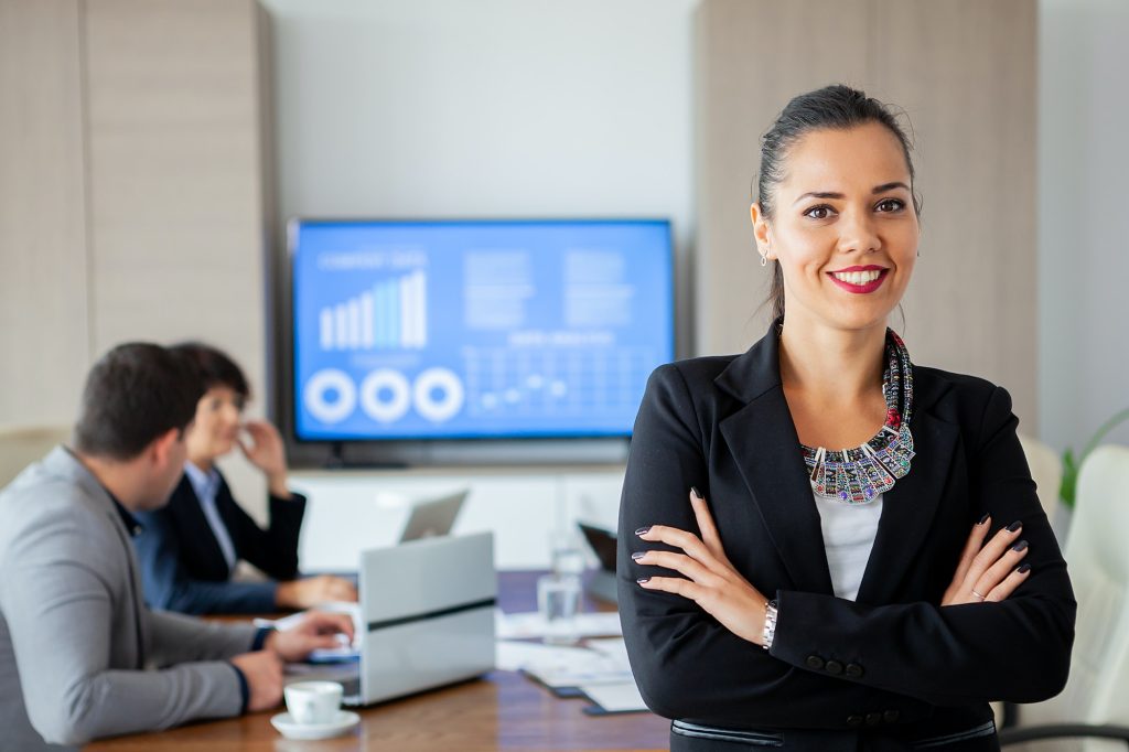 Happy beautiful bussines woman in conference room.